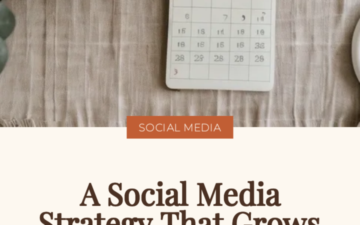 Paper wall calendar and a trailing plant above a linen surface, illustrating a social media strategy for growing a business